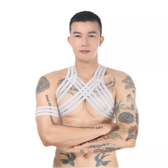 a sexy man in silver Men’s The Lewk Chest Harness Set – pridevoyageshop.com – gay men’s harness, lingerie and fetish wear