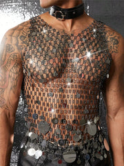 a sexy man in silver coinmail tank with metal discs draping over chest, showing sculpted torso and chain-style shimmer – pridevoyageshop.com – gay men’s harness, lingerie and fetish wear