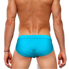 a sexy man in sky blue Men’s Clean Slate Swim Briefs - pridevoyageshop.com - gay men’s sexy swim briefs, trunks, board shorts, and bikinis