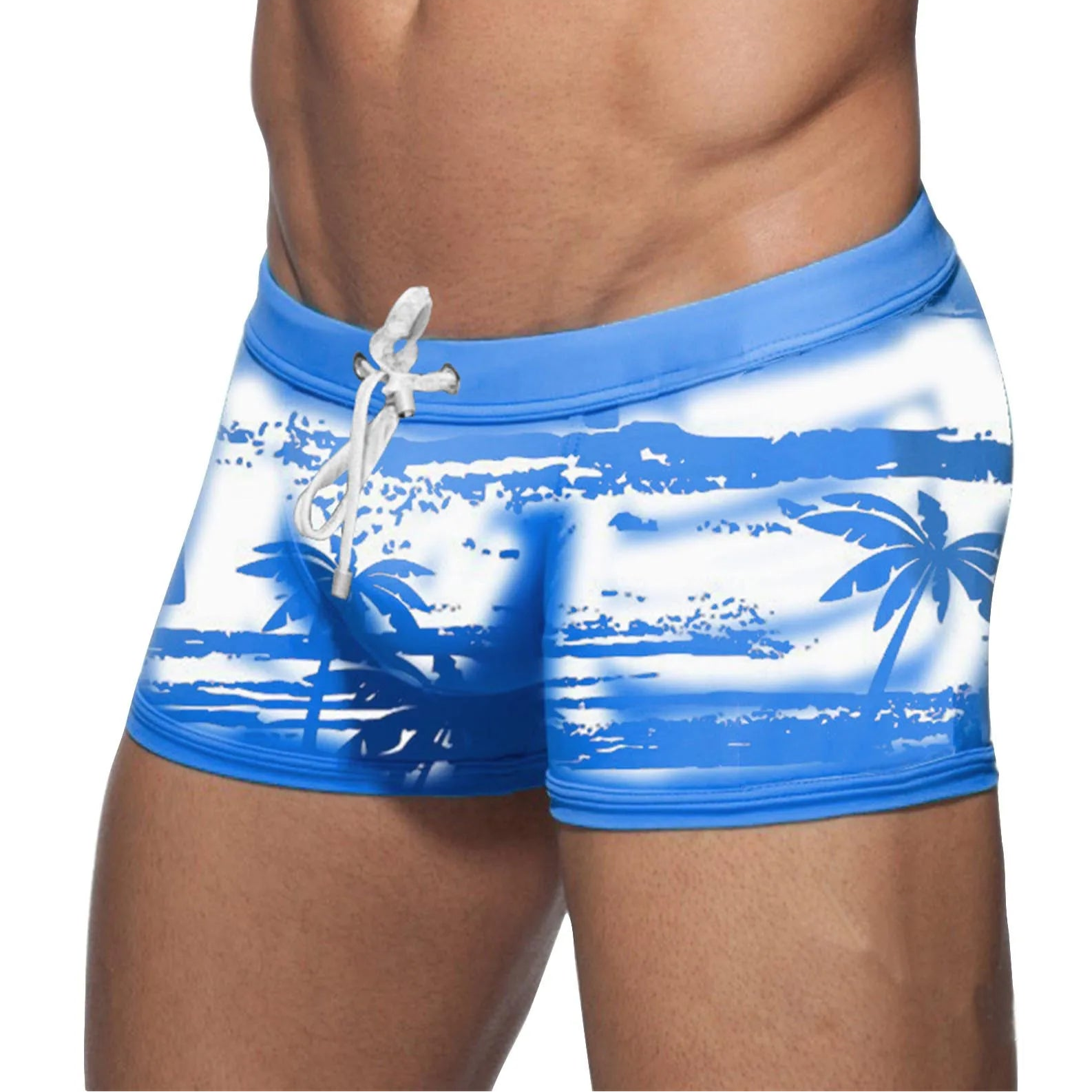 a sexy man in sky blue Men’s Holiday Hung Swim Trunks- pridevoyageshop.com - gay men’s sexy swim briefs, trunks, board shorts, and bikinis