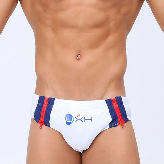 a sexy man in white Men’s Double Zipper Pouch Swim Briefs - pridevoyageshop.com - gay men’s sexy swim briefs, trunks, board shorts, and bikinis