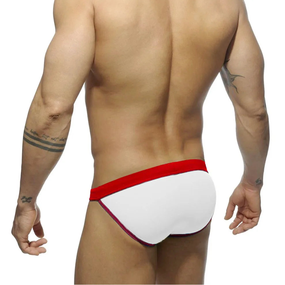 a sexy man in white Men’s Forbidden Fruit Bikini Swim Briefs - pridevoyageshop.com - gay men’s sexy swim briefs, trunks, board shorts, and bikinis