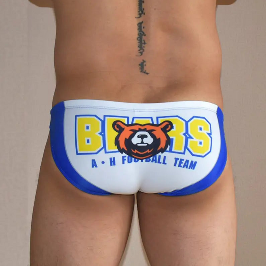 a sexy man in white Men’s Lil’ Bear Booty Swim Briefs - pridevoyageshop.com - gay men’s sexy swim briefs, trunks, board shorts, and bikinis