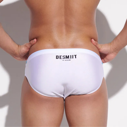 a sexy man in white Men’s Poolside Power Bottom Swim Briefs - pridevoyageshop.com - gay men’s sexy swim briefs, trunks, board shorts, and bikinis