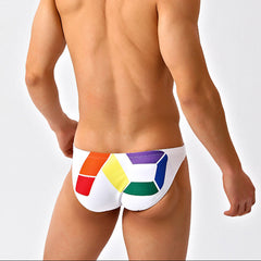 a sexy man in white Men’s Queer Grid Rainbow Pride Swim Briefs - pridevoyageshop.com - gay men’s sexy swim briefs, trunks, board shorts, and bikinis