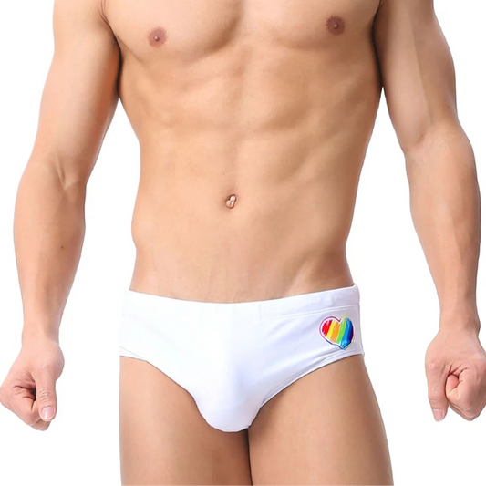 a sexy man in white Men’s Rainbow Heartbeat Swim Briefs - pridevoyageshop.com - gay men’s sexy swim briefs, trunks, board shorts, and bikinis