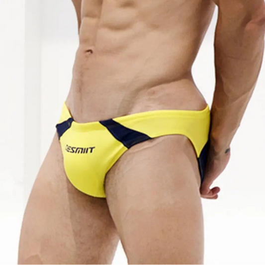 a sexy man in yellow Men’s Rival Jockline Bikini Swim Briefs - pridevoyageshop.com - gay men’s sexy swim briefs, trunks, board shorts, and bikinis