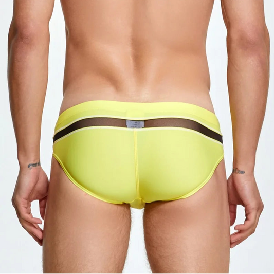 a sexy man in yellow Men’s Slit & Sizzle Mesh Eyes Swim Briefs - pridevoyageshop.com - gay men’s sexy swim briefs, trunks, board shorts, and bikinis