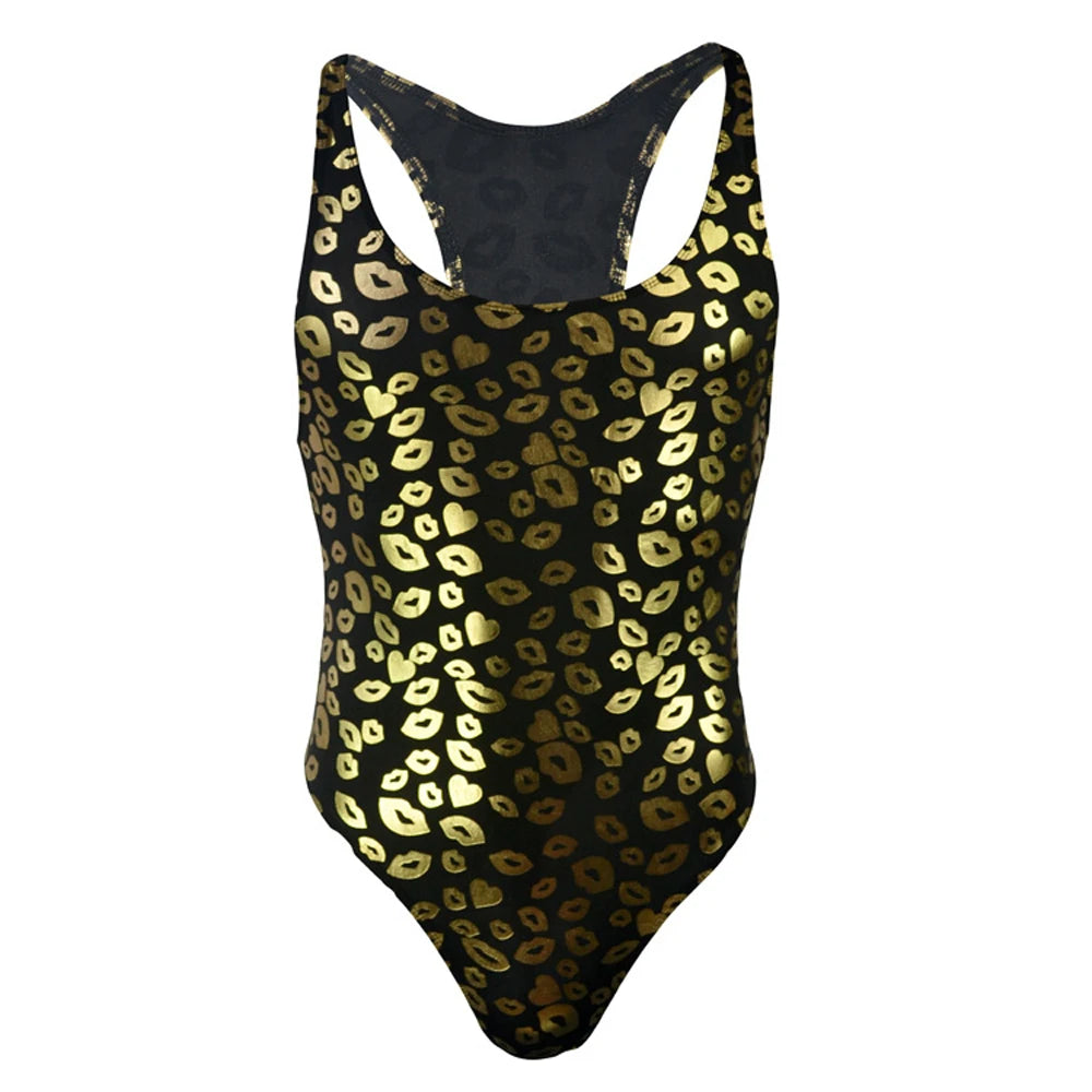 flat lay of black kiss-print racerback leotard with bold lip pattern and high-cut silhouette – pridevoyageshop.com – gay men’s harness, lingerie and fetish wear