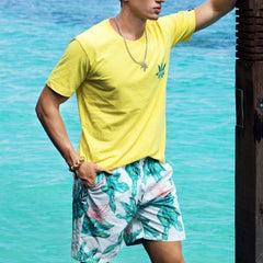 a hot gay guy in Flora Dive Board Shorts - pridevoyageshop.com - gay men’s underwear and swimwear