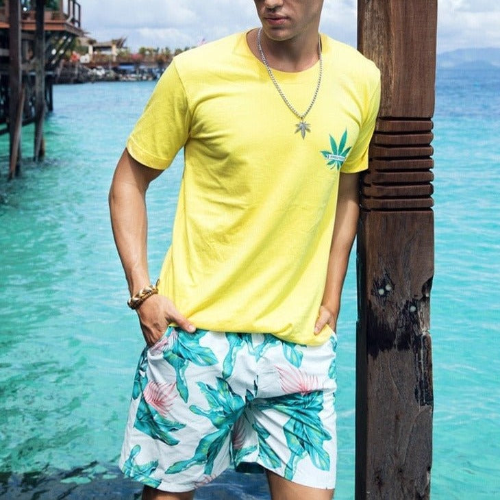 a hot gay guy in Flora Dive Board Shorts - pridevoyageshop.com - gay men’s underwear and swimwear