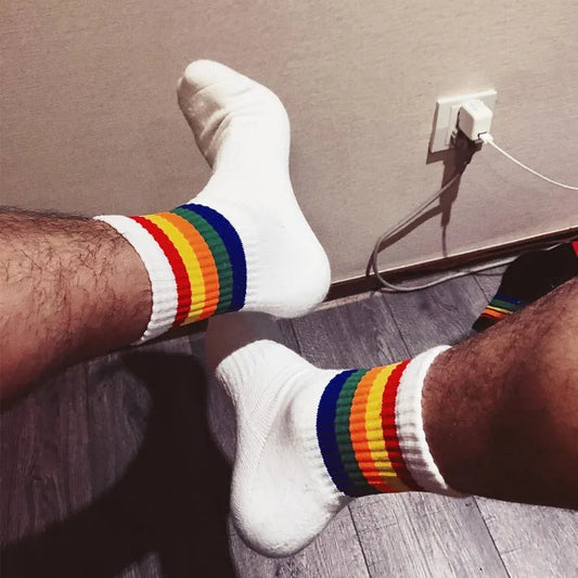 a sexy man in Rainbow Pride Crew Socks - pridevoyageshop.com - gay men's athletic socks, Pride rainbow crew socks