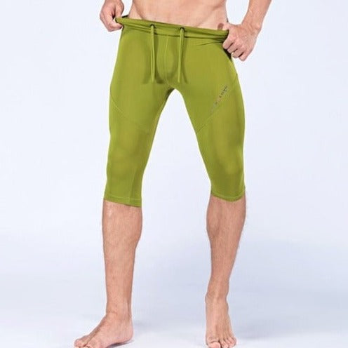 sexy gay man in light green Gay Leggings | Men's Sexy 3/4 Compression Sport Leggings - pridevoyageshop.com - gay men’s underwear and activewear