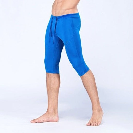 sexy gay man in blue Gay Leggings | Men's Sexy 3/4 Compression Sport Leggings - pridevoyageshop.com - gay men’s underwear and activewear