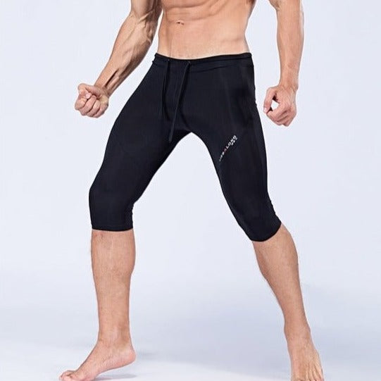 sexy gay man in black Gay Leggings | Men's Sexy 3/4 Compression Sport Leggings - pridevoyageshop.com - gay men’s underwear and activewear