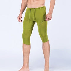 sexy gay man in light green Gay Leggings | Men's Sexy 3/4 Compression Sport Leggings - pridevoyageshop.com - gay men’s underwear and activewear