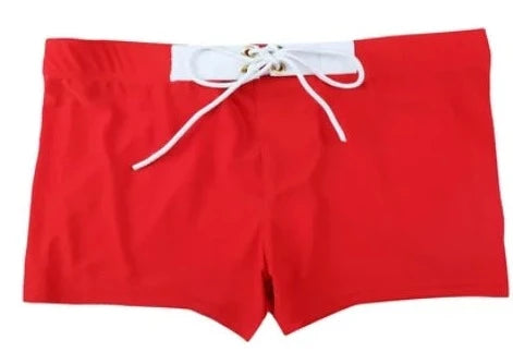 a hot gay man in red Solid Color Bowtie Swim Trunks - pridevoyageshop.com - gay men’s underwear and swimwear