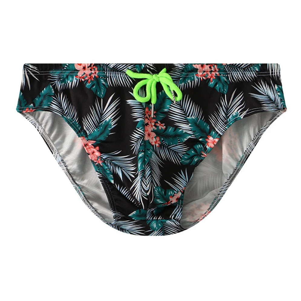 Black Men’s Cockatoo Cove Swim Briefs - pridevoyageshop.com - gay men’s sexy swim briefs, trunks, board shorts, and bikinis