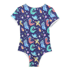 Gaylaxy Dinos Daddy’s Boy Printed Onesie laid flat, stretchy cartoon fabric, cute bold print, snap-front playful cut – pridevoyageshop.com – gay men’s harness, lingerie and fetish wear