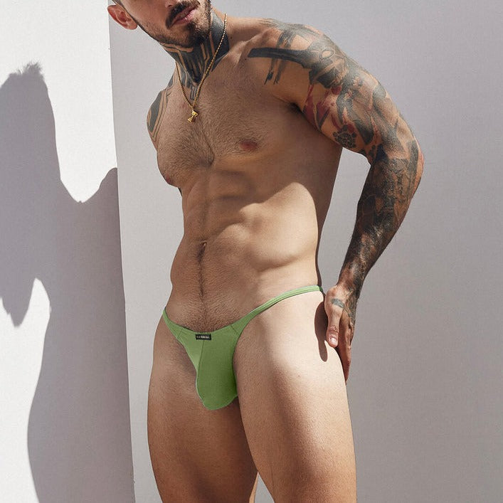 a sexy gay man in green The Brave G-String Thong - pridevoyageshop.com - gay men’s underwear and swimwear