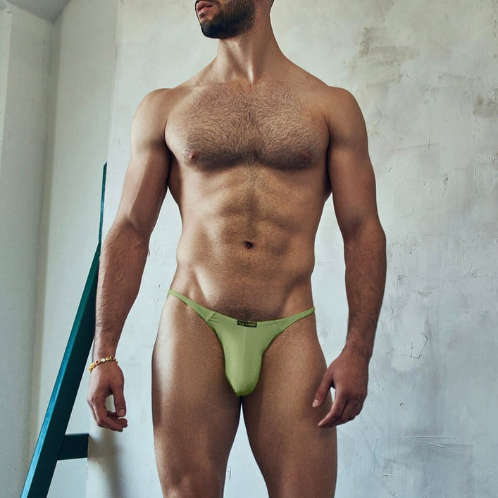 a sexy gay man in green The Brave G-String Thong - pridevoyageshop.com - gay men’s underwear and swimwear