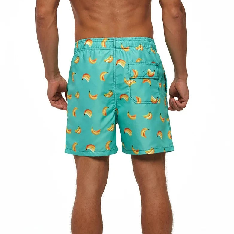 a hot gay man in Falling Bananas Board Shorts - pridevoyageshop.com - gay men’s underwear and swimwear