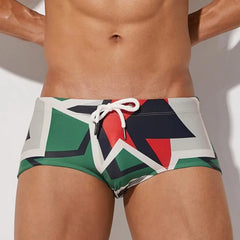 a hot gay man in Men's Mod Geo Swim Trunks - pridevoyageshop.com - gay men’s underwear and swimwear