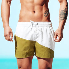 a hot guy in white Tidal Charm Two Toned Board Shorts - pridevoyageshop.com - gay men’s underwear and swimwear