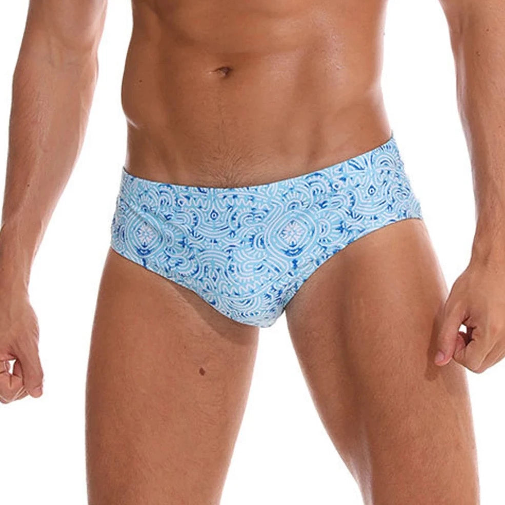 a sexy gay man in Men's Azure Paisley Swim Briefs - pridevoyageshop.com - gay men’s underwear and swimwear