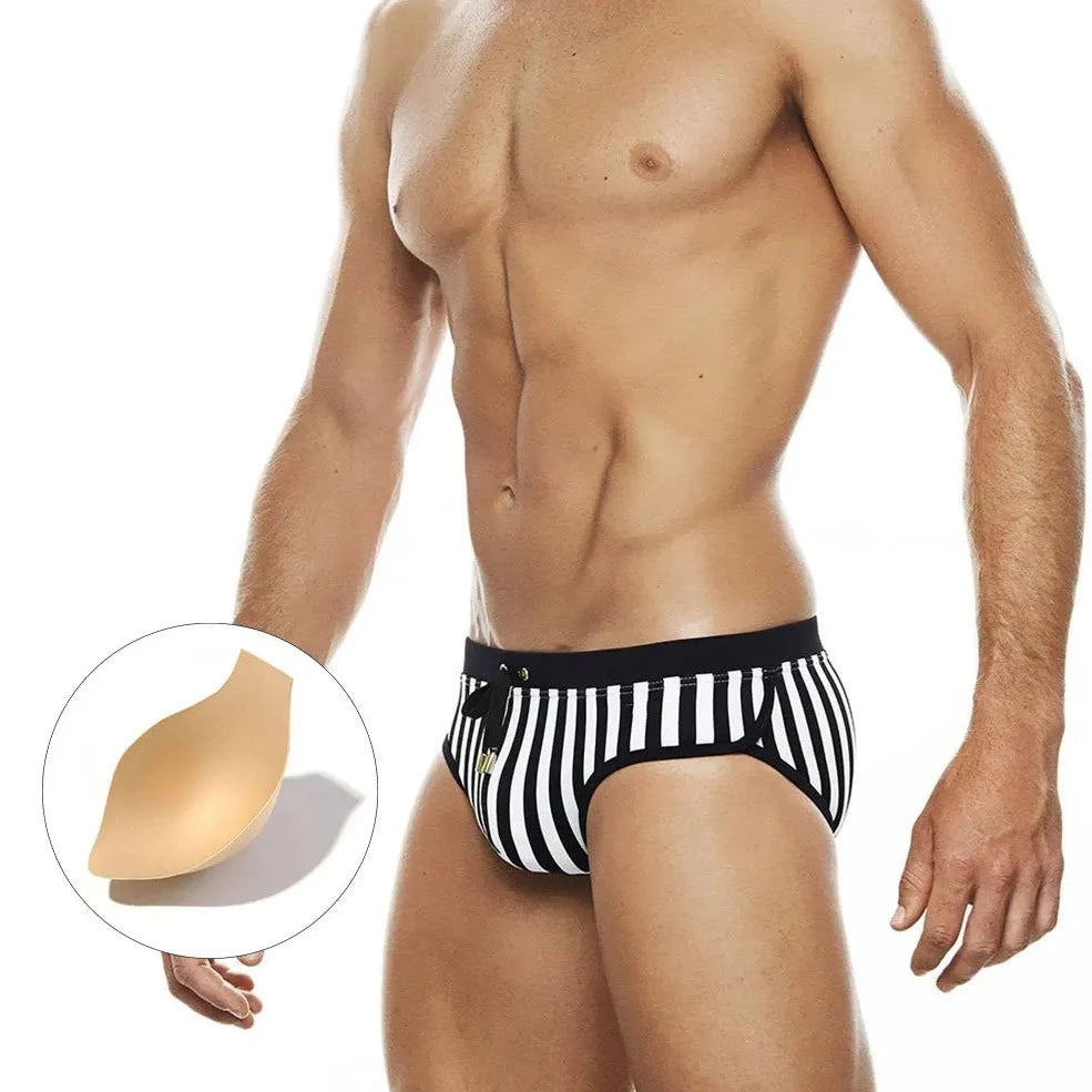 a sexy gay man in Wild Zebra's Stripes Swim Briefs - pridevoyageshop.com - gay men’s underwear and swimwear