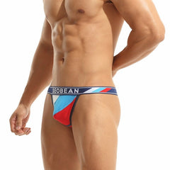 hot gay man in navy Color Block Jockstrap: Best Jockstrap & Classic Jockstrap- pridevoyageshop.com - gay men’s underwear and swimwear