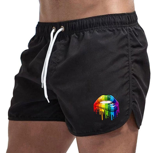 black Gay Swimwear & Beachwear | Rainbow Lips Print Board Shorts - pridevoyageshop.com - gay men’s underwear and swimwear