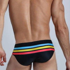 hot gay man in black Gay Swimwear | Vibrant Stripes Swim Briefs- pridevoyageshop.com - gay men’s underwear and swimwear