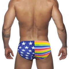 a hot gay man in Men's Patriotic Rainbow Swim Briefs - pridevoyageshop.com - gay men’s underwear and swimwear