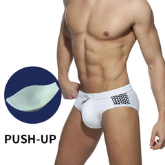 a sexy gay man in white Monochrome Matrix Swim Briefs - pridevoyageshop.com - gay men’s underwear and swimwear