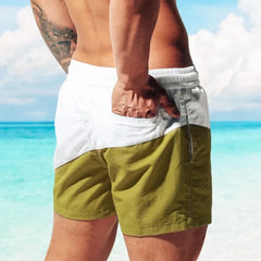 a hot guy in white Tidal Charm Two Toned Board Shorts - pridevoyageshop.com - gay men’s underwear and swimwear