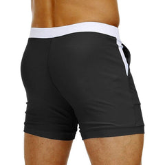hot gay man in black Gay Swimwear & Beachwear | Drawstring Boxer Swim Trunks - pridevoyageshop.com - gay men’s underwear and swimwear