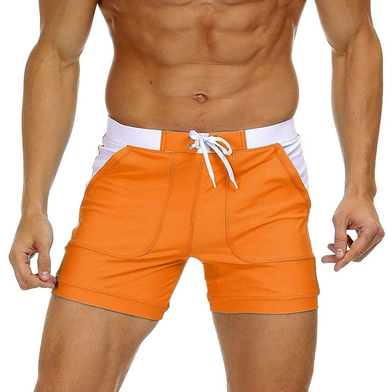 hot gay man in orange Gay Swimwear & Beachwear | Drawstring Boxer Swim Trunks - pridevoyageshop.com - gay men’s underwear and swimwear