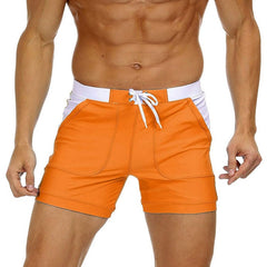 hot gay man in orange Gay Swimwear & Beachwear | Drawstring Boxer Swim Trunks - pridevoyageshop.com - gay men’s underwear and swimwear