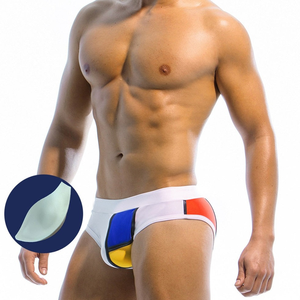 sexy gay man in white Gay Swimwear | Piet Mondrian Art Deco Swim Briefs- pridevoyageshop.com - gay men’s underwear and swimwear