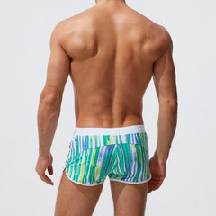 sexy gay man in green Gay Swimwear | Men' s Striped Swim Trunks With Zipper Pocket - pridevoyageshop.com - gay men’s underwear and swimwear
