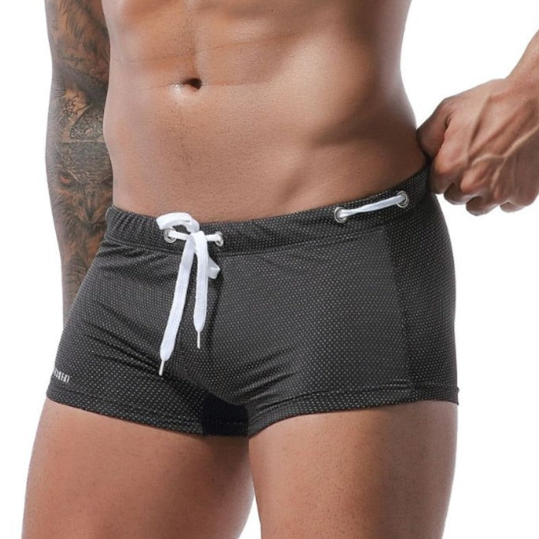 hot gay man in black Gay Swimwear & Beachwear | Men's Bowtie Tight Swim Trunks - pridevoyageshop.com - gay men’s underwear and swimwear
