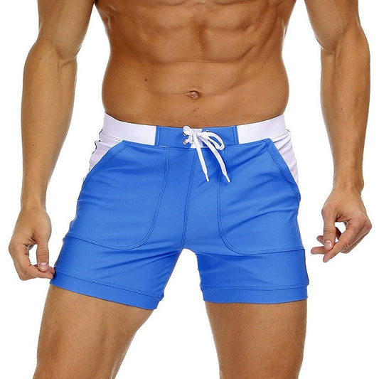 hot gay man in Royal Blue Gay Swimwear & Beachwear | Drawstring Boxer Swim Trunks - pridevoyageshop.com - gay men’s underwear and swimwear