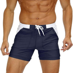 hot gay man in navy Gay Swimwear & Beachwear | Drawstring Boxer Swim Trunks - pridevoyageshop.com - gay men’s underwear and swimwear