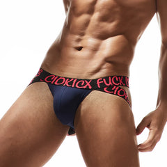 a hot gay man in navy Rebel Jockstrap - pridevoyageshop.com - gay men’s underwear and swimwear