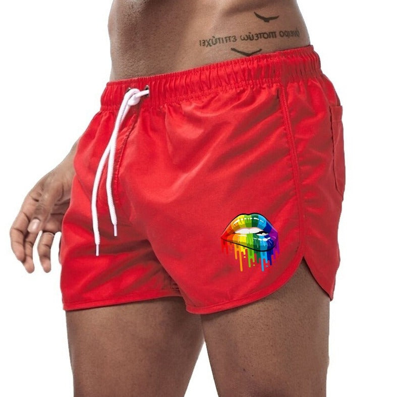 red Gay Swimwear & Beachwear | Rainbow Lips Print Board Shorts - pridevoyageshop.com - gay men’s underwear and swimwear