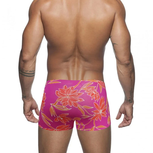 a hot gay man in pink Bold Neon Forest Swim Trunks - pridevoyageshop.com - gay men’s underwear and swimwear