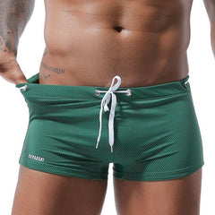 hot gay man in green Gay Swimwear & Beachwear | Men's Bowtie Tight Swim Trunks - pridevoyageshop.com - gay men’s underwear and swimwear