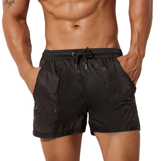sexy gay man in black Gay Beachwear | Men's Transparent Board Shorts with Pockets - pridevoyageshop.com - gay men’s underwear and swimwear