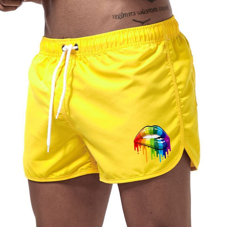 yellow Gay Swimwear & Beachwear | Rainbow Lips Print Board Shorts - pridevoyageshop.com - gay men’s underwear and swimwear